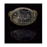 MEDIEVAL BRONZE RING WITH CARVED GEM