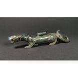 A CHINESE BRONZE FIGURE OF A DRAGON