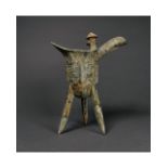 A BRONZE RITUAL WINE VESSEL, JUE