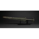 ANCIENT BRONZE SWORD WITH DECORATED HANDLE