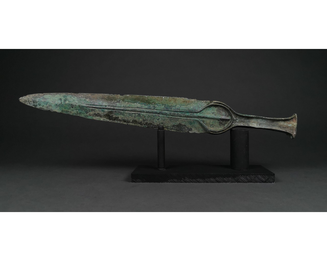 SUPERB ANCIENT BRONZE SWORD WITH IBEX HANDLE