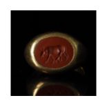 LARGE ROMAN GOLD RING WITH BULL INTAGLIO