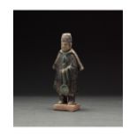 CHINESE MING DYNASTY GLAZED ATTENDANT FIGURE