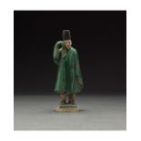 CHINESE MING DYNASTY GLAZED ATTENDANT FIGURE