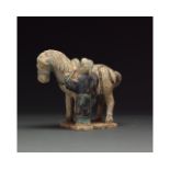 MING DYNASTY TERRACOTTA HORSE AND GROOM FIGURE