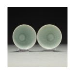 A PAIR OF CELADON-GROUND BOWLS, CHINA