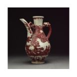 AN IRON-RED AND WHITE GLAZED PORCELAIN EWER, CHINA