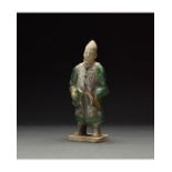 CHINESE MING DYNASTY GLAZED ATTENDANT FIGURE