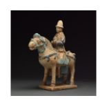 MING DYNASTY TERRACOTTA HORSE AND RIDER FIGURE