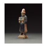 CHINESE MING DYNASTY GLAZED ATTENDANT FIGURE