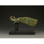 AMLASH BRONZE ZOOMORPHIC AXE HEAD ON STAND