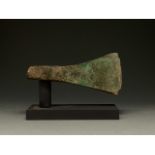 LARGE BRONZE AGE AXE ON STAND