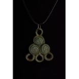 BRONZE AGE COILED AMULET
