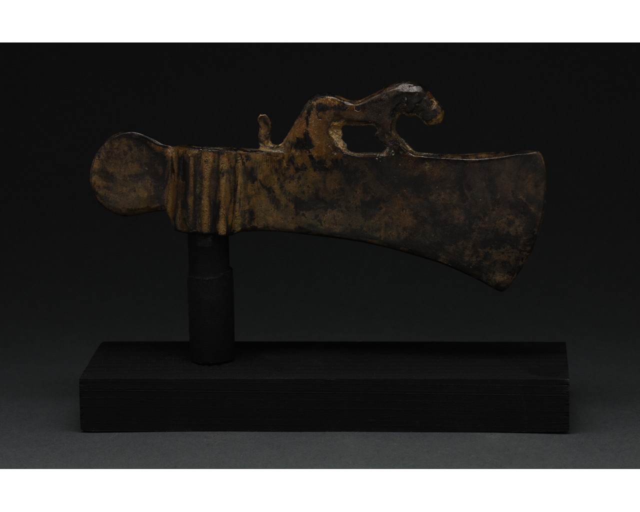 BRONZE AGE AXE HEAD WITH STYLISED TIGER