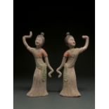 CHINA, TANG DYANSTY PAIR OF POTTERY DANCING LADIES