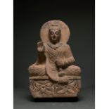 GANDHARA SCHIST FIGURE OF SEATED BUDDHA