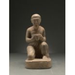 GANDHARA SCHIST STONE FIGURE OF KNEELING WORSHIPER