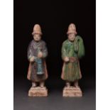 CHINA, MING DYNASTY GLAZED POTTERY PAIR OF ATTENDANTS