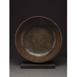 ISLAMIC, SELJUK BRONZE PLATE WITH GEOMETRIC DESIGS