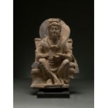 GANDHARA SCHIST STONE FIGURE OF SEATED BUDDHA