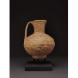 ISLAMIC, SELJUK DECORATED POTTERY JUG