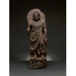 MAJESTIC GANDHARA SCHIST FIGURE OF STANDING BODHISATTVA