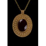 ROMAN GOLD MEDALLION WITH GARNET STONE