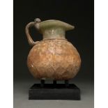 LARGE ROMAN NET-PATTERN GLASS FLASK WITH HANDLE