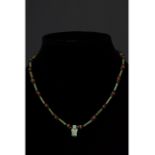 EGYPTIAN FAIENCE BEADED NECKLACE WITH AMULET