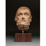 ROMAN MARBLE HEAD OF A BEARDED MAN