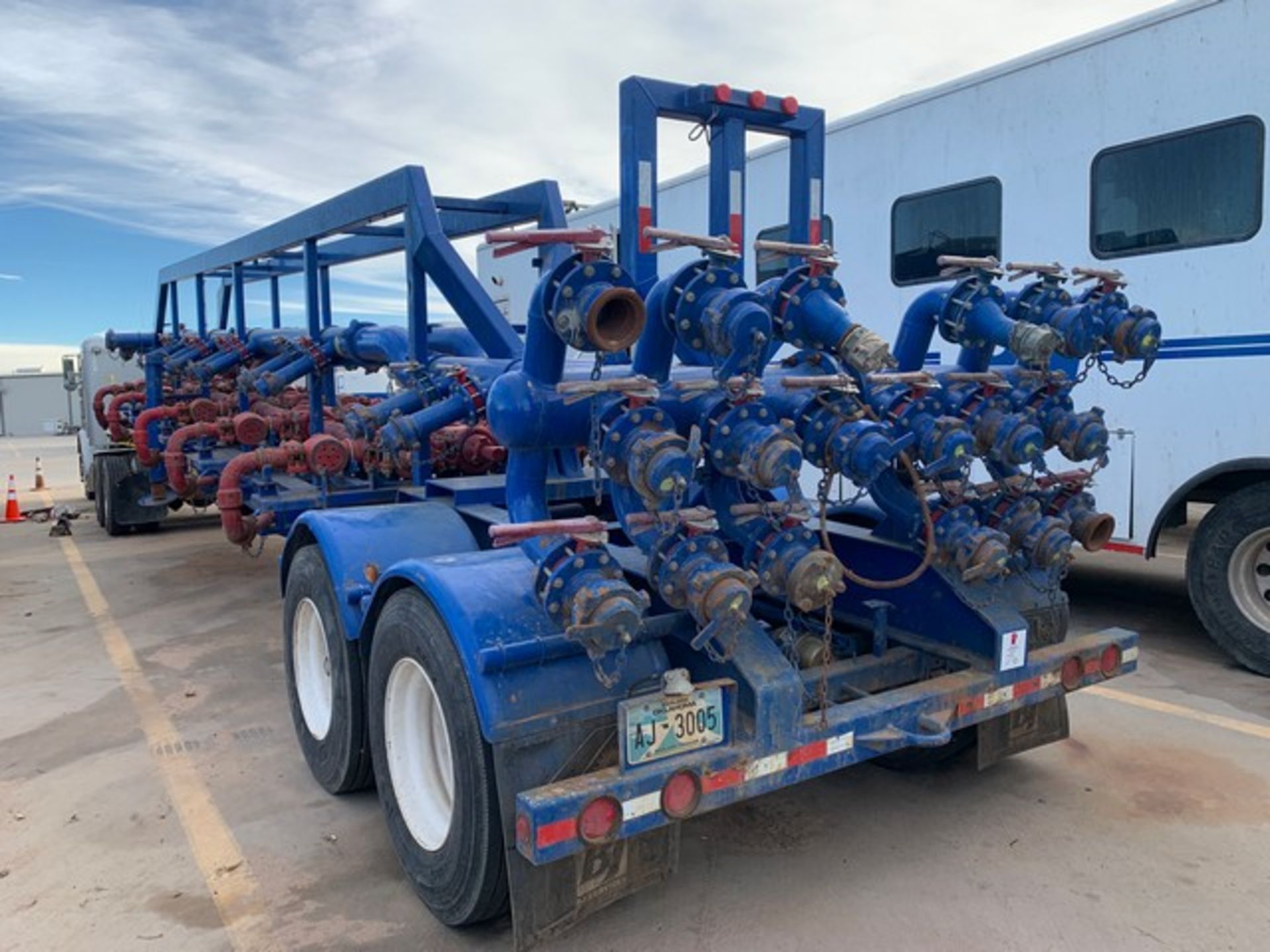 Located in YARD 2 - Odessa, TX (FIF045) 2011 WORLEY T/A 10 STATION SPM IRON MANIFOLD TRAILER, VIN-