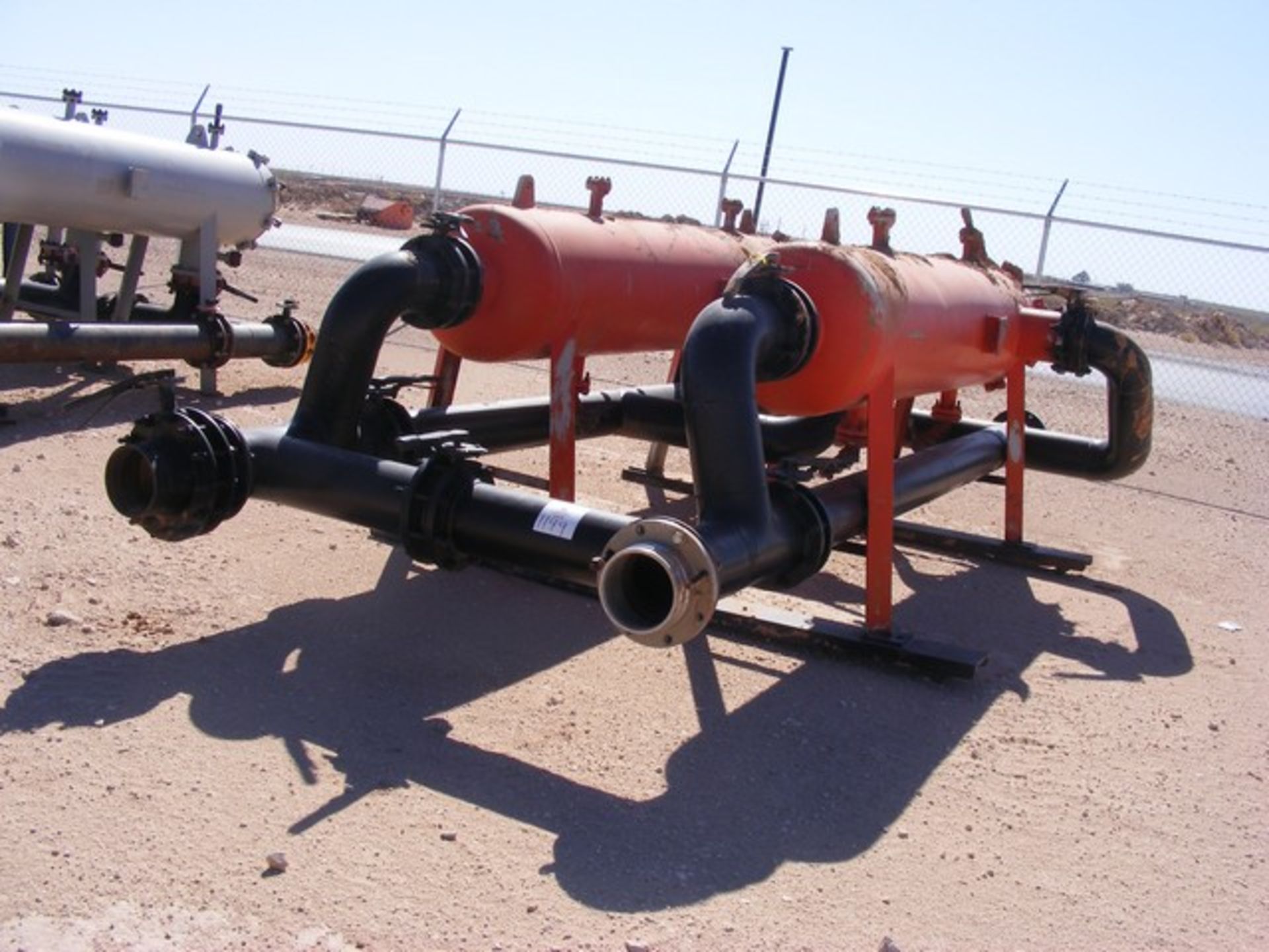 Located in YARD 1 - Midland, TX (1949) 24" X 10' FILTER POD CANISTERS W/ 8" PIPE VALVES