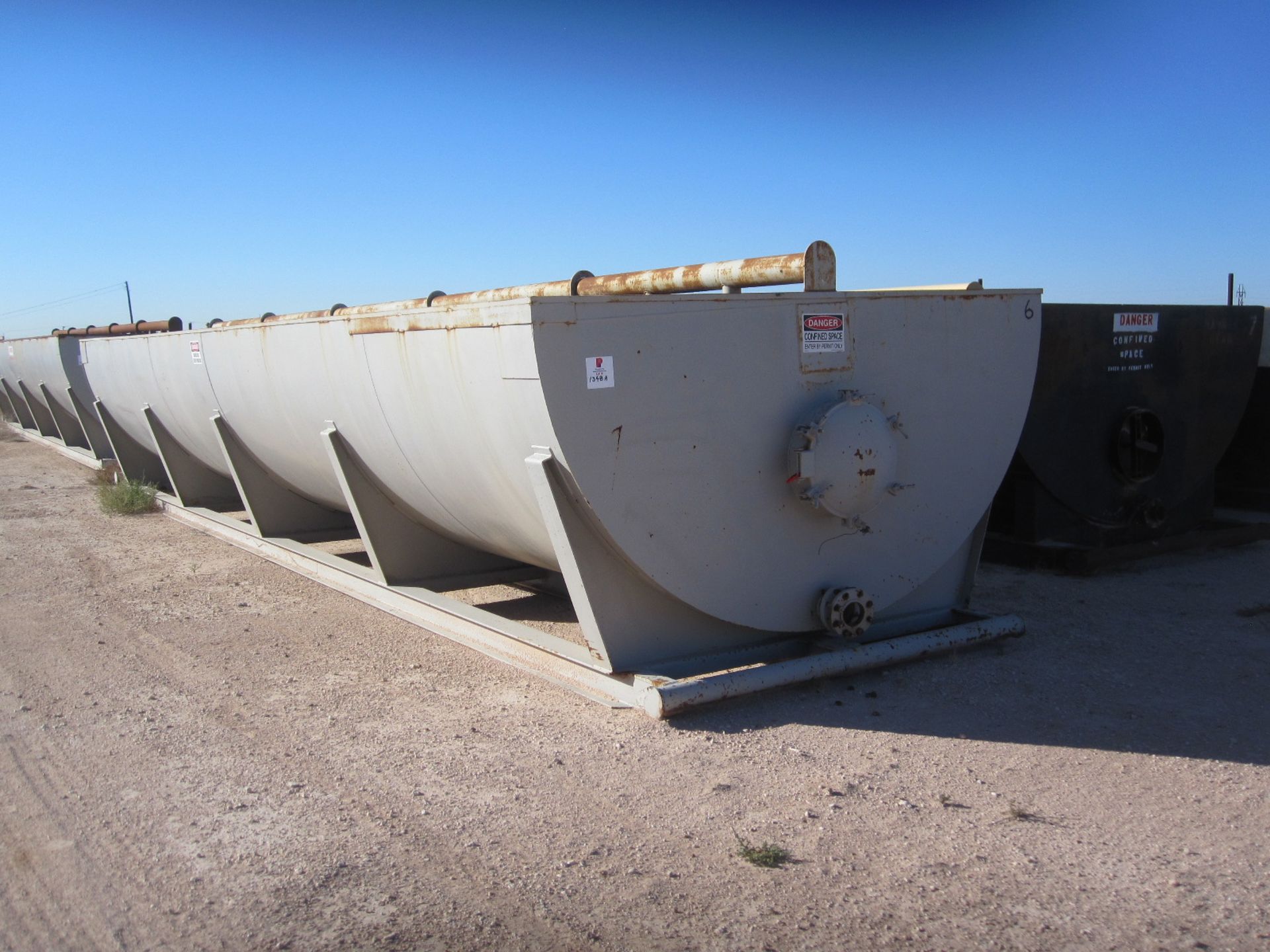 Located in YARD 22 - Odessa, TX (6251) 10'D, 250 BBL FLOW BACK TANK, RD BOTTOM, SGL COMP, LADDER,