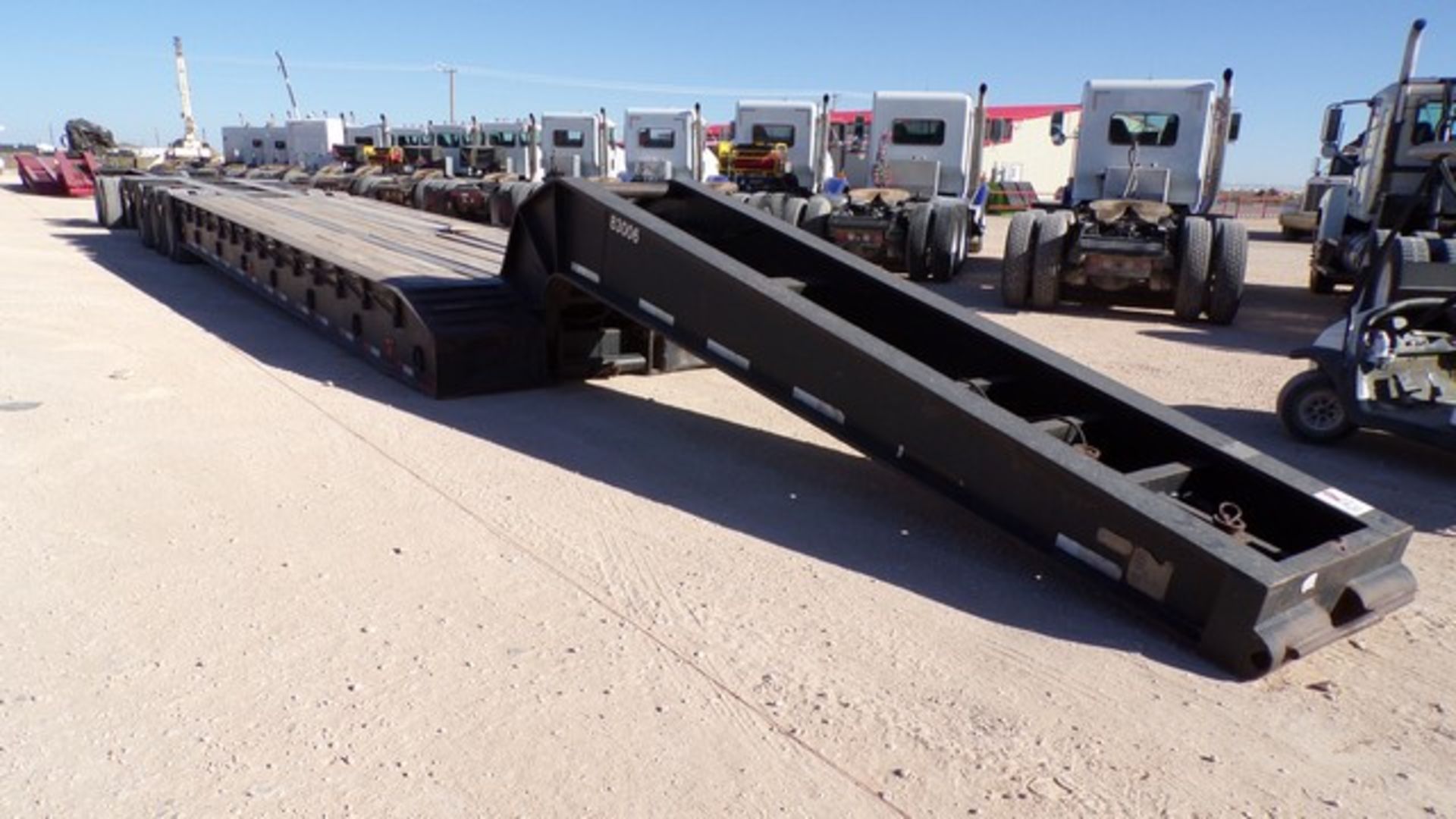 Located in YARD 1 - Midland, TX (X) 1983 TRANSPORT SYSTEMS 75 TON, 3 AXLE RGN DROP DECK TRAILER,