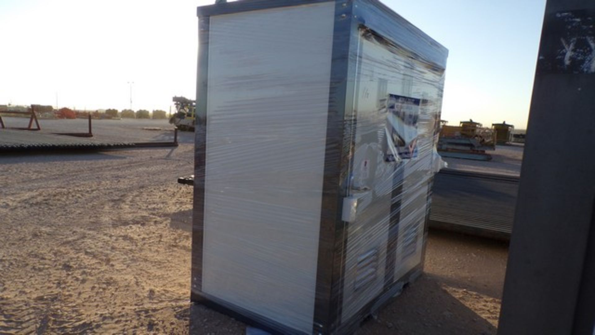 Located in YARD 1 - Midland, TX NEW 110V PORTABLE DBL STALL TOILET