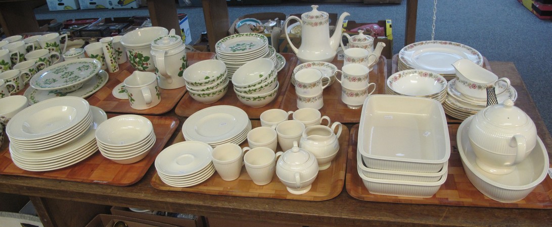 Three trays of Wedgwood Windsor creamware porcelain tea and dinnerware to include; teapot, cups,
