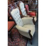 Two Victorian style mahogany framed button back upholstered fireside type armchairs, together with