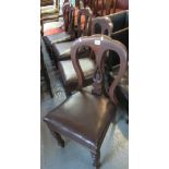 A set of four Victorian mahogany dining chairs with leather finish seats on turned supports. (4) (