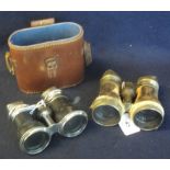 Two pairs of opera/field glasses, one in leather case. (2) (B.P. 24% incl. VAT)