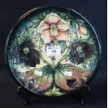 Modern Moorcroft art pottery tube lined cabinet plate or charger, decorated with multi-coloured