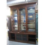 Early 20th Century mahogany two stage display cabinet with mirrored back and glass adjustable