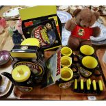 Advertising tray of assorted Marmite items to include; teddy bear, toast rack, mugs, metal sign,