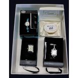 Three modern dress watches in original boxes, together with a Speidel gilt metal bracelet. (4) (B.P.