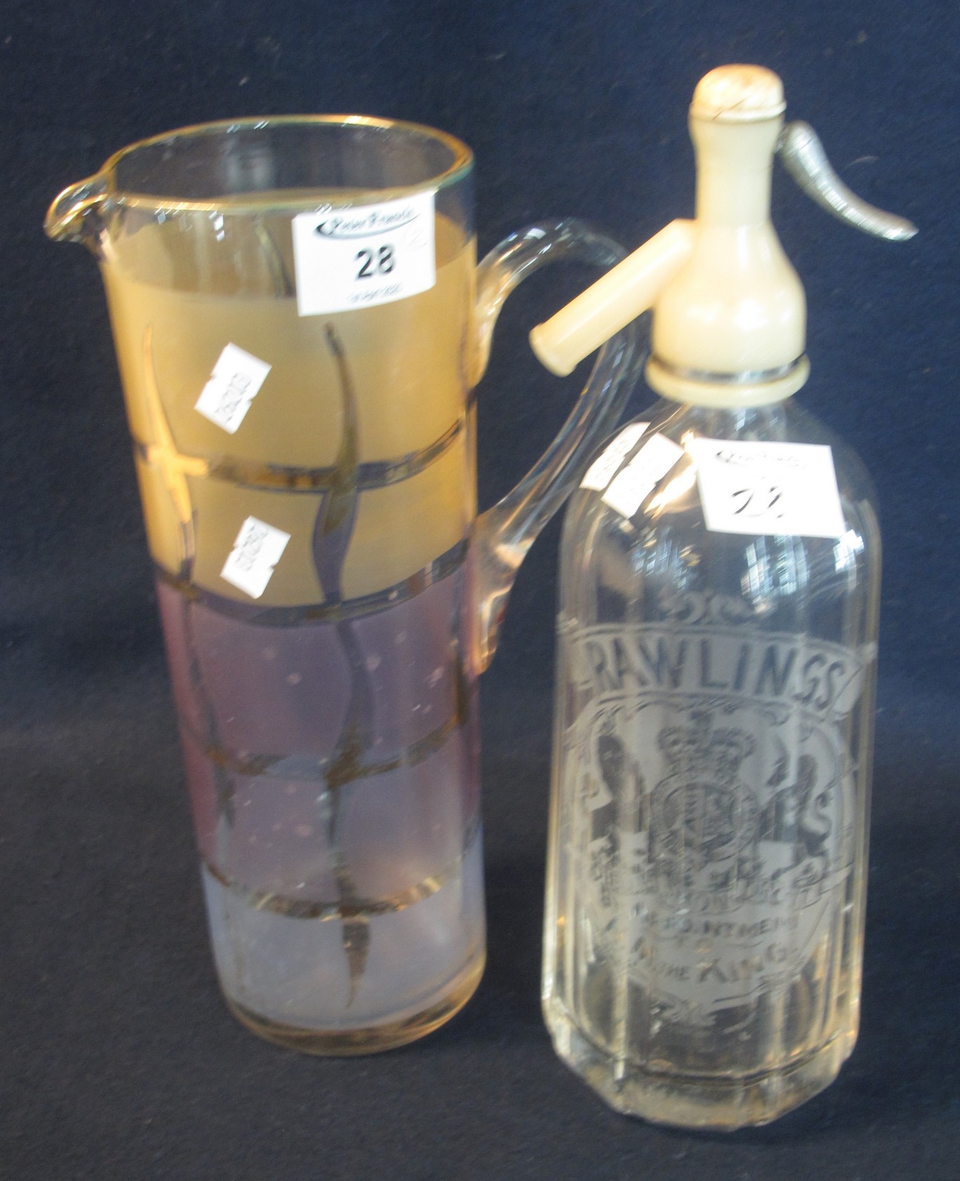 Vintage Rawlings soda syphon, together with a straight sided single handled water jug. (2) (B.P. 24%