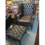 Chesterfield style button back leather wing armchair with matching stool or footrest. Together