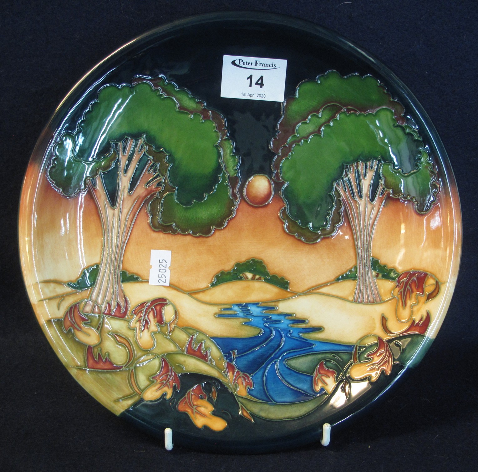 Modern Moorcroft art pottery tube lined cabinet plate or charger, overall depicting a forest and