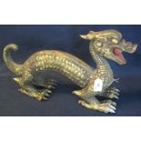 Large carved and gilded wooden dragon, his mouth holding a pearl. (B.P. 24% incl. VAT)