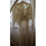 Vintage (probably 30's or 40's) cream colour floral pattern strapless wedding dress with a