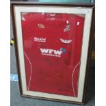 Framed Llanelli Scarlets KooGa rugby shirt with various team signatures. Overall 92 x 67cm
