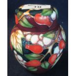 Modern Moorcroft art pottery tube lined ginger jar and cover of baluster form, overall decorated